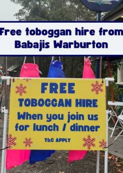 A sign says free toboggan hire at babajis warburton